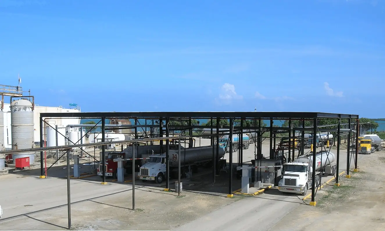 Trucks inside loading rack